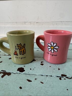 2 “Life is Good Mugs” Both Mugs ” “Do what you like. Like what you do”Green Pink